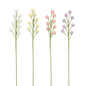 Heklete blomsterstilker med små runde blomster i hvit, lysegul, lyserosa og lilla
